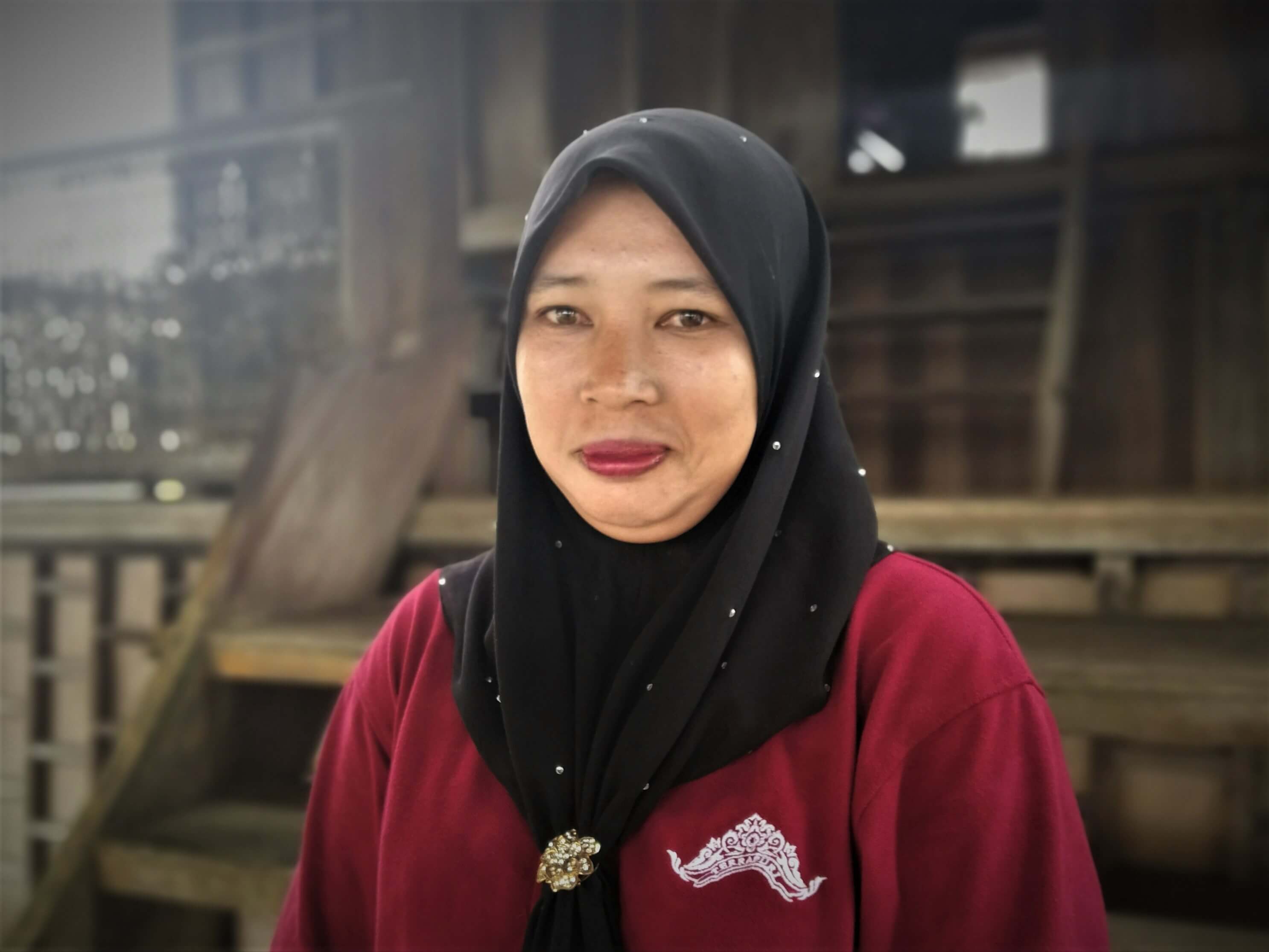 Wati has been working at Terrapuri since 2015. Even without guests at the resort during the pandemic, she has been keeping busy packing goods for the resort's online store. Photo by Alexandra Wong